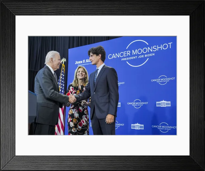 Framed Print : President Joe Biden greets Ambassador Caroline Kennedy and her son John Jack Schlossberg after delivering his Cancer Moonshot speech, Sept