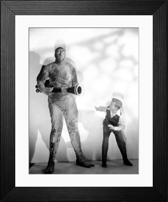 Framed Print : INVADERS FROM MARS, Jimmy Hunt (right), 1953, cowering from the invader