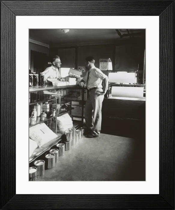 Framed Print : General store shopkeeper and customer, Ohio, Aug. 1931. The store has a modest inventory with Pepsi sign the only big brand offered. (BSLOC_2013_7_108)