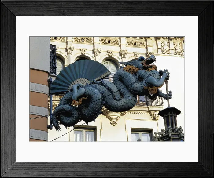 Framed Print : VILASECA I CASANOVAS, Josep (1848-1910). Bruno Quadros House or Umbrella House. 1896. SPAIN. CATALONIA. Barcelona. Ramblas. Detail of the dragon that decorates the faade Framed Print : VILASECA I CASANOVAS, Josep (1848-1910). Bruno Quadros House or Umbrella House. 1896. SPAIN. CATALONIA. Barcelona. Ramblas. Detail of the dragon that decorates the faade
