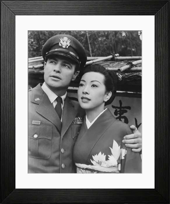 Framed Print : SAYONARA, from left: Marlon Brando, Miiko Taka, 1957
