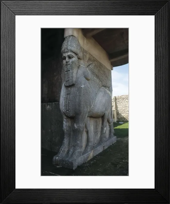 Framed Print : IRAQ. Kalhu. Nimrud. Palace of Assur-Nasir-Pal II (12th c. BC). Winged bull. Assyrian art. Relief on rock. AISA / Everett Collection**US SALES ONLY**