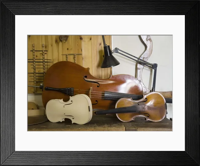 Framed Print : ITALY. Cremona. Luthier's workshop. String instruments: cello and violn. AISA / Everett Collection**US SALES ONLY**