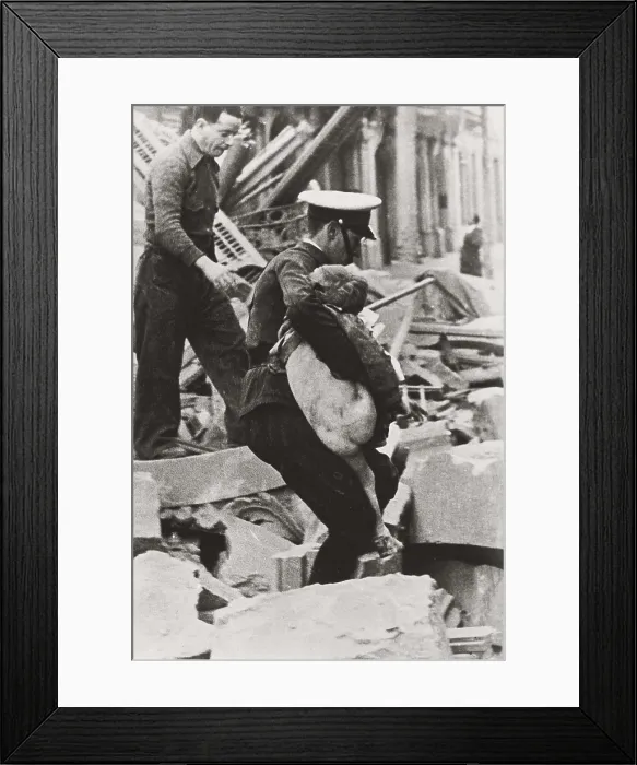 Framed Print : SPAIN. Barcelona. Spanish Civil War (1936-1939). Bombardment of Barcelona (30th January 1938). A child is rescued among the ruins. AISA / Everett Collection**US SALES ONLY**