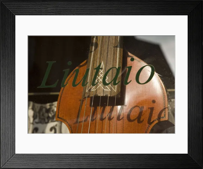 Framed Print : ITALY. Cremona. Luthier's workshop. Detail of a double bass in the shop window. AISA / Everett Collection**US SALES ONLY**