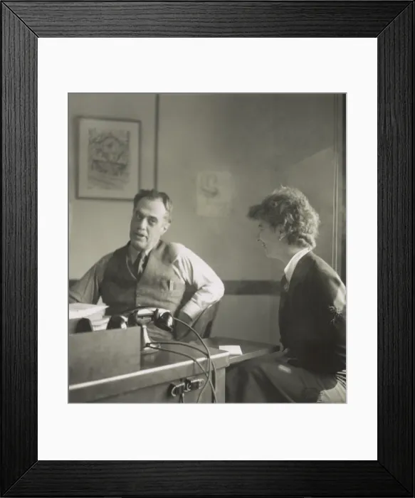 Framed Print : Director of the Federal Writers Project, Henry Alsberg, and writer Katharine Amend Kellock, of the Federal Writers Project at work in the Ouray Building, Washington, DC