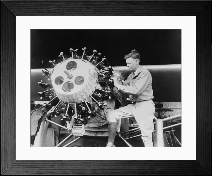 Framed Print : Lindbergh examining the cylinders of the Spirit of St. Louis before his Transatlantic Flight, May 1927 (BSLOC_2020_2_69)