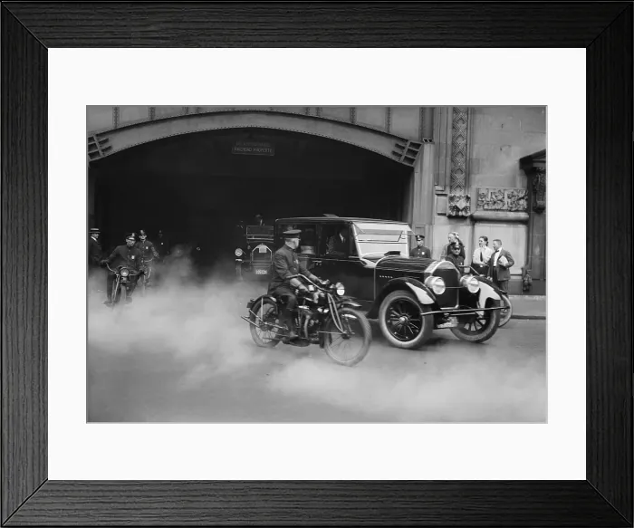 Framed Print : President Calvin Coolidge's car escorted by motorcycle police in New York City. The President and First Lady Grace Coolidge can be seen inside the car. Ca. 1923-29
