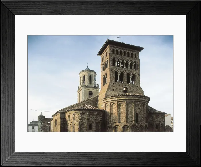 Framed Print : Church of San Tirso. SPAIN. Sahagn. Church of San Tirso (romanesque-mudejar, 12th c.), and tower of the monastery of San Facundo, next tojunto al Camino de Santiago (Way of Saint James)