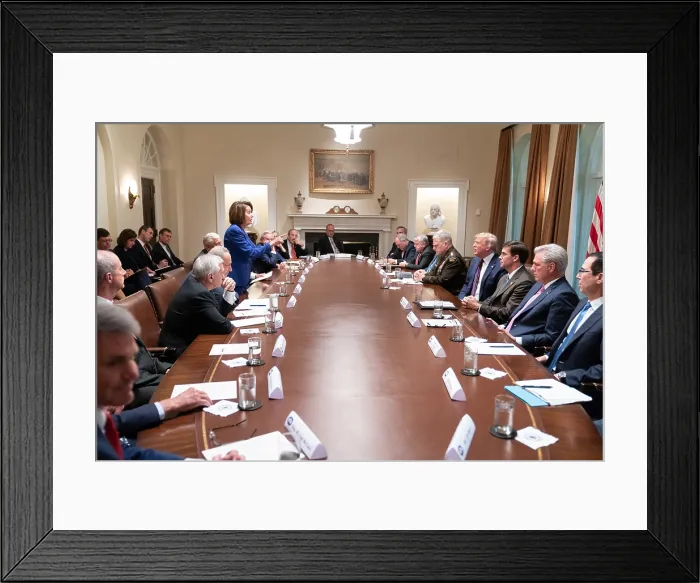 Framed Print : House Speaker Nancy Pelosi stood up to leave, after President Trump called her a third-rate politician, in an Oct. 19, 2019 meeting in the White House Cabinet Room