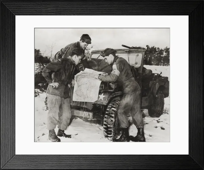 Framed Print : Elvis Presley and other soldiers read a map on maneuvers in Germany. He served with the with 1st Medium Tank Battalion, 3d Armored Division. Ca. 1959 - (BSLOC_2014_17_106)