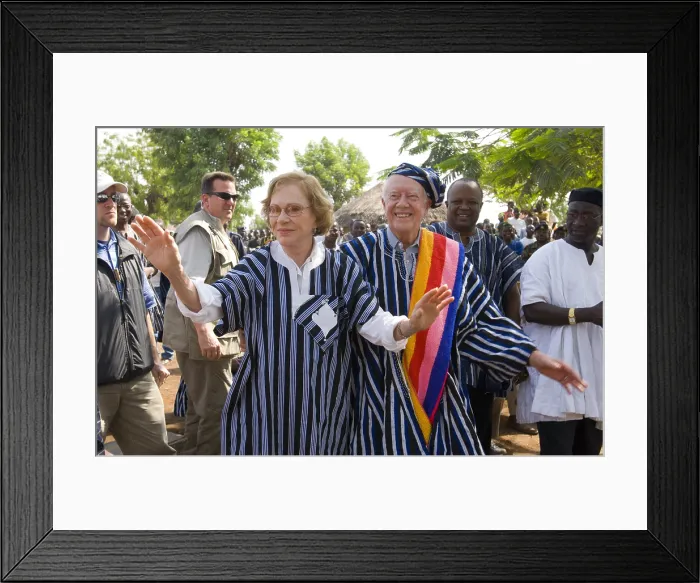 Framed Print : Former President Jimmy Carter and Rosalynn Carter wear traditional clothing in Tingoli, in northern Ghana Framed Print : Former President Jimmy Carter and Rosalynn Carter wear traditional clothing in Tingoli, in northern Ghana