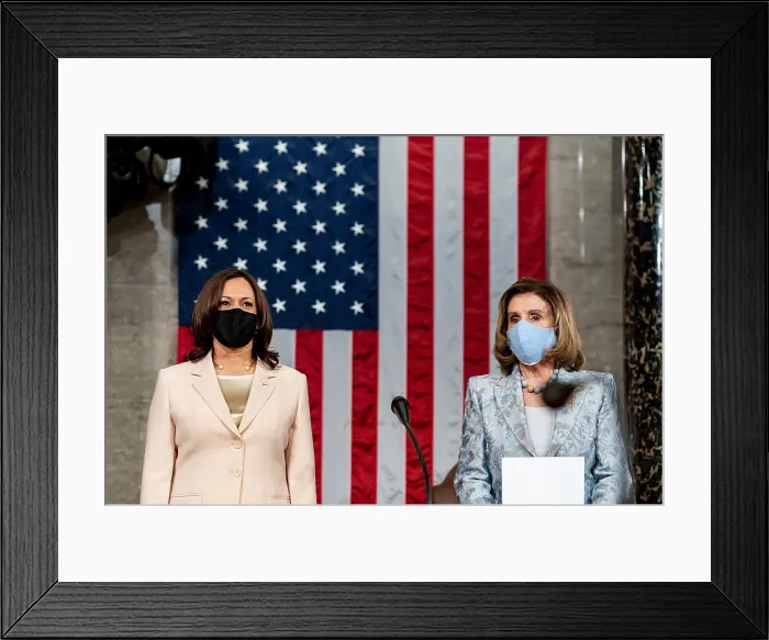 Framed Print : Vice President Kamala Harris and House Speaker Nancy Pelosi stand on the rostrum of the US House of Representatives after President Joe Bidens speech on April 28, 2021
