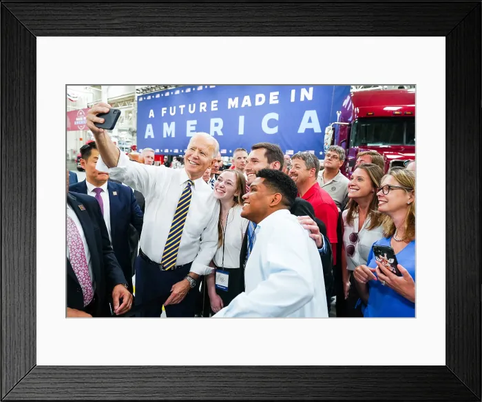 Framed Print : President Joe Biden takes a selfie with workers at the Mack Lehigh Valley Operations assembly plant, July 28, 2021
