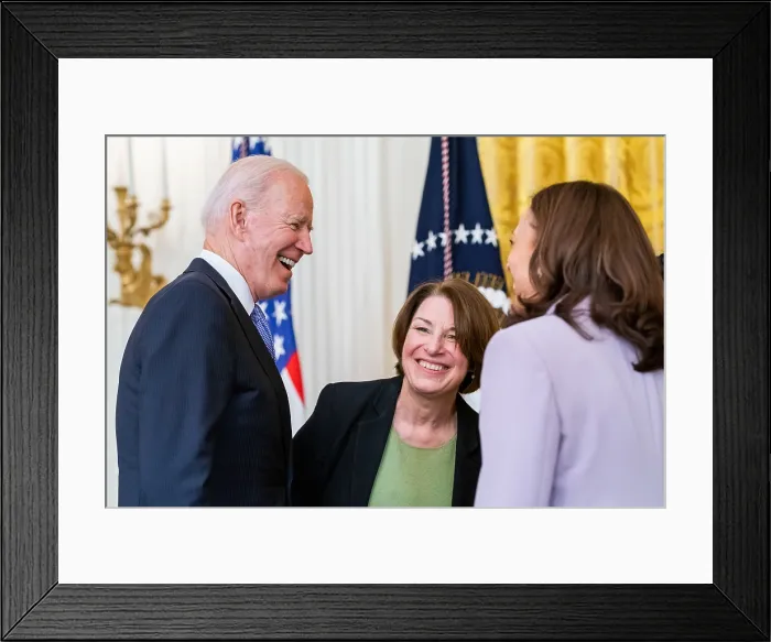 Framed Print : President Joe Biden with Vice President Kamala Harris and Senator Amy Klobuchar, following the signing of the Victims of Crime Act Fix to Sustain the Crime Victims Fund, July 22
