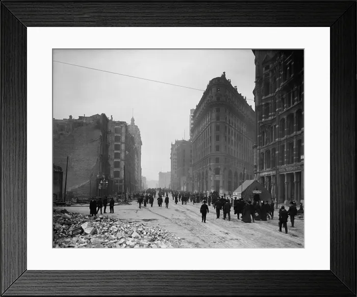 Framed Print : People walking on Market St. after the April 18, 1906 San Francisco earthquake and 3-day fire. Note the tent housing emergency operations of the Postal Telegraph Co