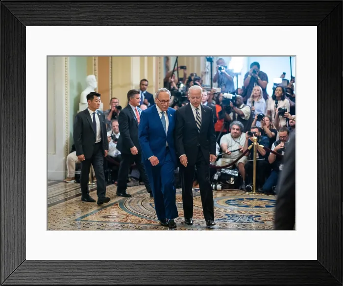 Framed Print : President Joe Biden and Senate Majority Leader Chuck Schumer depart the US Capitol after speaking with the press, in Washington, D.C. July 14, 2021 (BSLOC_2021_14_9)