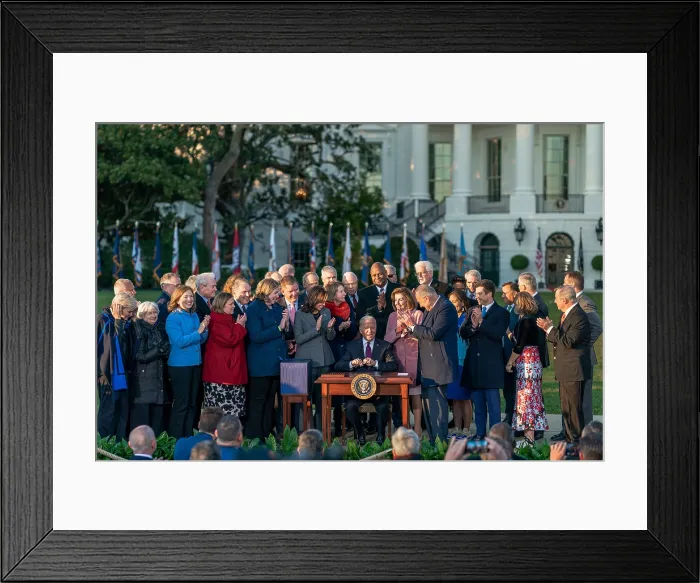 Framed Print : President Joe Biden signs the Infrastructure Investment and Jobs Act. The $1.2 trillion dollar legislation won passage with bi-partisan votes on Nov. 5, 2021. Ten days later, Nov