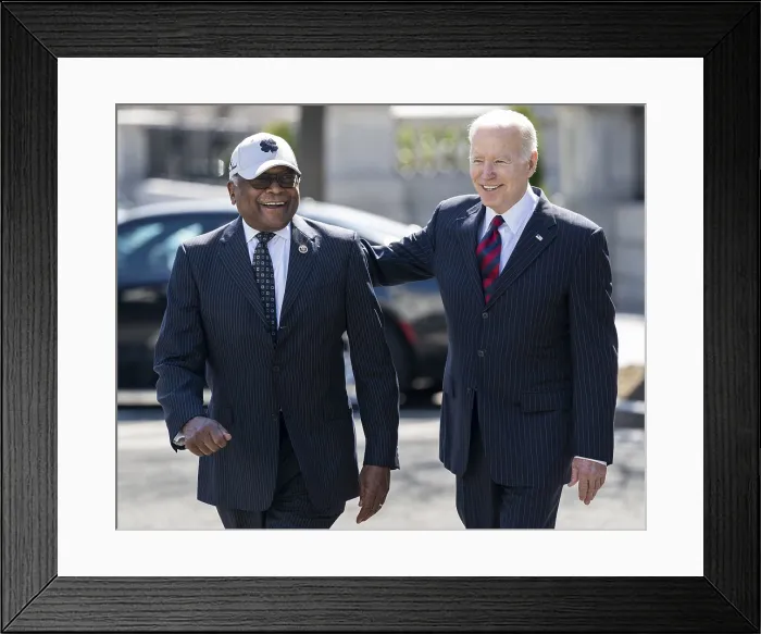 Framed Print : President Joe Biden walks with congressman Jim Clyburn, House majority whip, after signing the Consolidated Appropriations Act of 2022