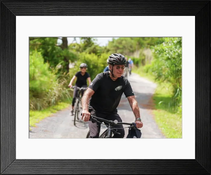 Framed Print : President Joe Biden and First Lady Jill Biden go for a bike ride on Gordon's Pond bike trail, July 31, 2023, Rehoboth Beach, Delaware. (BSLOC_2023_8_6) Framed Print : President Joe Biden and First Lady Jill Biden go for a bike ride on Gordon's Pond bike trail, July 31, 2023, Rehoboth Beach, Delaware. (BSLOC_2023_8_6)