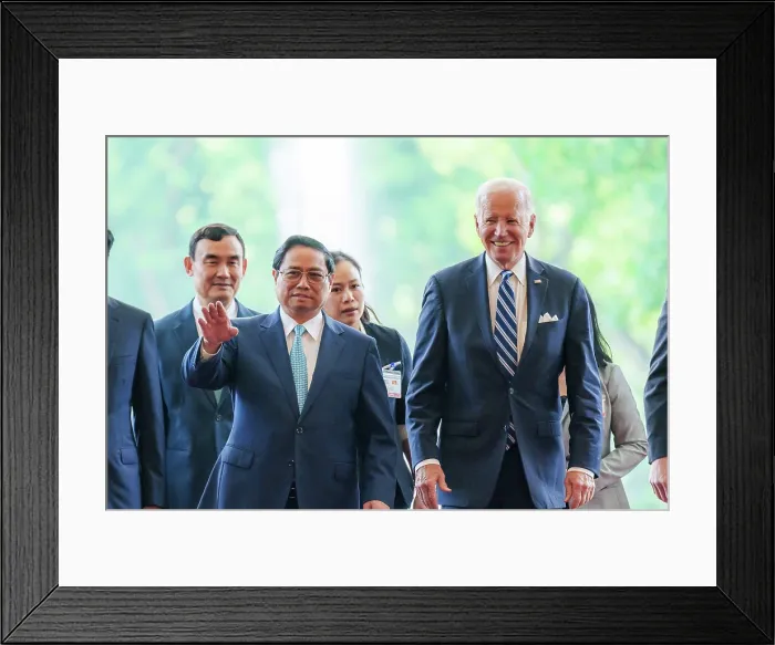 Framed Print : President Joe Biden arrives at the Office of Government in Hanoi, Vietnam, Sept. 11, 2023 and greets Prime Minister of the Socialist Republic of Vietnam Pham Minh Chnh