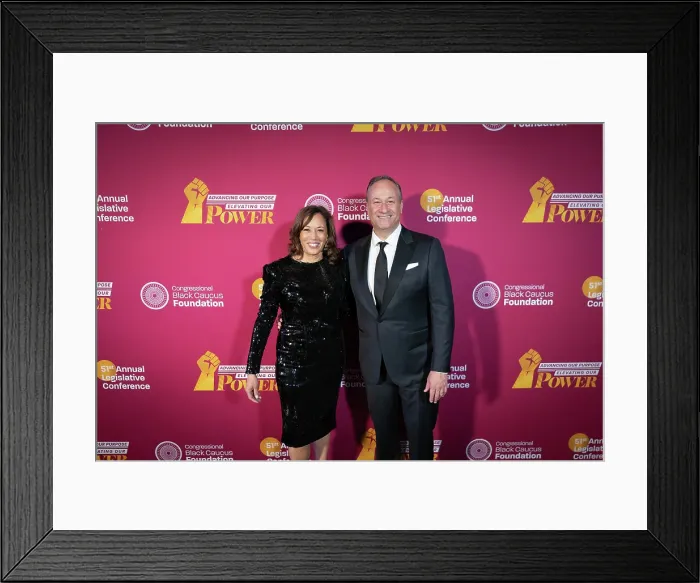 Framed Print : Vice President Kamala Harris and Second Gentleman Douglas Emhoff pose for a Red Carpet photo at the Congressional Black Caucus, Foundation Phoenix Awards, Sept. 23, 2023