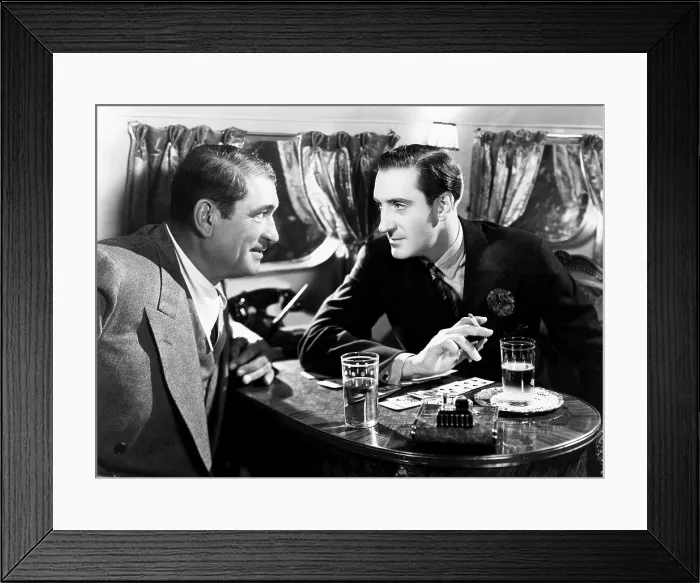 Framed Print : RIO, from left, Victor McLaglen, Basil Rathbone, 1939