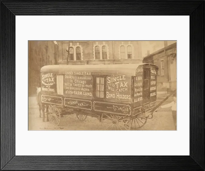 Framed Print : Henry George was an economist who believed value derived from land belonged to society. This wagon, c. 1890, displays slogans promoting Georges Single Tax