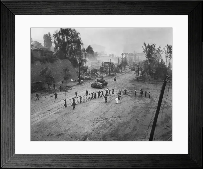 Framed Print : U.S. Marine tank follows a line of prisoners of war down a street. Sept. 26, 1950. Probably near Seoul, Korea. Korean War, 1950-53. (BSLOC_2014_11_163) Framed Print : U.S. Marine tank follows a line of prisoners of war down a street. Sept. 26, 1950. Probably near Seoul, Korea. Korean War, 1950-53. (BSLOC_2014_11_163)