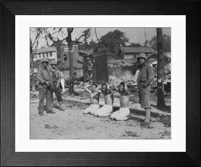 Framed Print : U.S. Marines guarding three captured North Koreans, in an urban setting. Ca. 1950. Probably near Seoul, Korea. Exact date / location unknown. Korean War, 1950-53 Framed Print : U.S. Marines guarding three captured North Koreans, in an urban setting. Ca. 1950. Probably near Seoul, Korea. Exact date / location unknown. Korean War, 1950-53