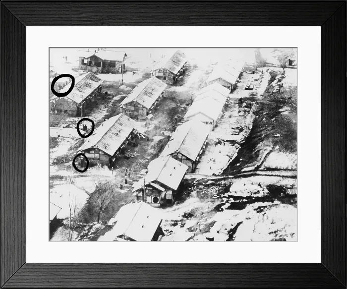 Framed Print : Aerial photo taken by a low flying U.S. Air Force jet of Chiktong POW camp in North Korea. In the circles are men, some waving. Ca. 1950-51. Korean War, 1950-53
