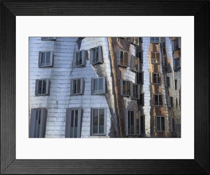 Framed Print : GEHRY, Frank (1929). GERMANY. Dsseldorf. Building complex located at the Media harbour. Detail of the Neuer Zollhof 2 or middle building, with mirror surface (1998). Architecture
