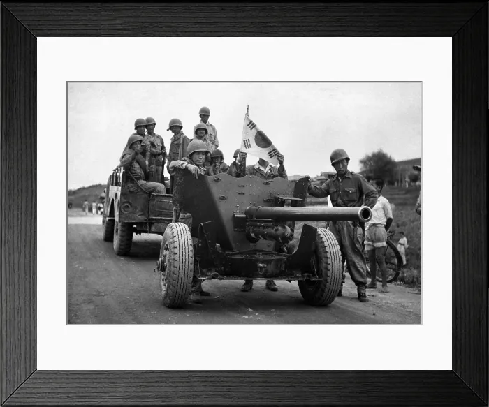 Framed Print : Korean civilians killed while fleeing from the North Korean forces, on Aug. 25, 1950. In the distance other refugees continue their flight south Framed Print : Korean civilians killed while fleeing from the North Korean forces, on Aug. 25, 1950. In the distance other refugees continue their flight south
