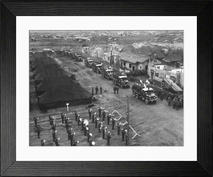 Framed Print : Convoy carrying former Chinese POWs leaving Ascom Village, Korea, en route to Inchon Harbor. From there they will travel to Taiwan, now home to the exiled Nationalist Chinese