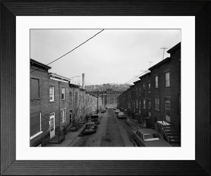 Framed Print : Yonkers, New York, ca. 1980. Moquette Row Housing, were built by the Moquette Textile Mills for workers after a lengthy strike in 1885. View east showing front elevation Framed Print : Yonkers, New York, ca. 1980. Moquette Row Housing, were built by the Moquette Textile Mills for workers after a lengthy strike in 1885. View east showing front elevation