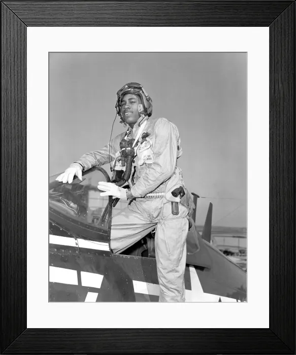 Framed Print : African American aviator of the 1st Marine Aircraft Wing in Korea climbs from his Corsair fighter bomber. April 19, 1953. Korean War, 1950-53. (BSLOC_2014_11_208) Framed Print : African American aviator of the 1st Marine Aircraft Wing in Korea climbs from his Corsair fighter bomber. April 19, 1953. Korean War, 1950-53. (BSLOC_2014_11_208)