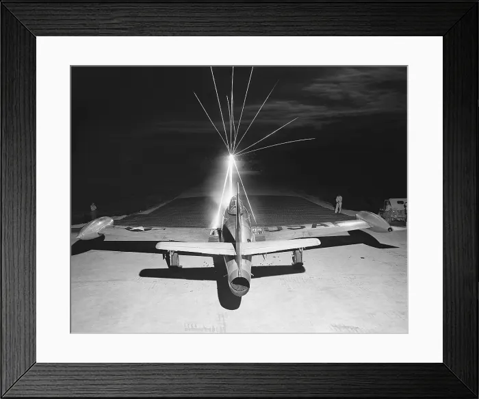Framed Print : F-84 Thunderjet firing.50 caliber tracer bullets as maintenance men test the wing guns Framed Print : F-84 Thunderjet firing.50 caliber tracer bullets as maintenance men test the wing guns