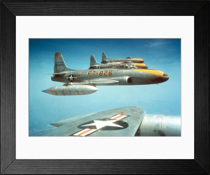 Framed Print : F-80C jet fighters fly in formation ca. 1950