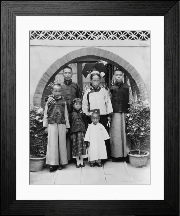 Framed Print : A Manchu family dressed in traditional Manchurian clothing. The daughter has natural feet since the Manchu women did not bind their feet