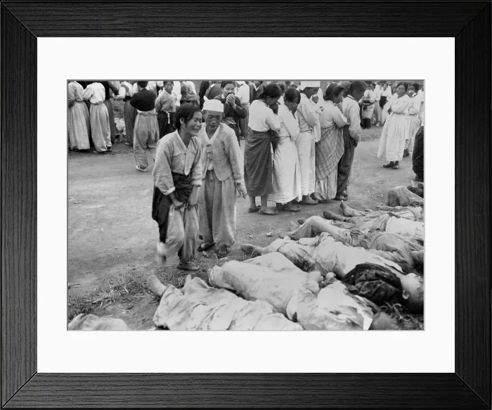 Framed Print : Koreans from Hamhung identify bodies of political prisoners killed by the North Korean Army