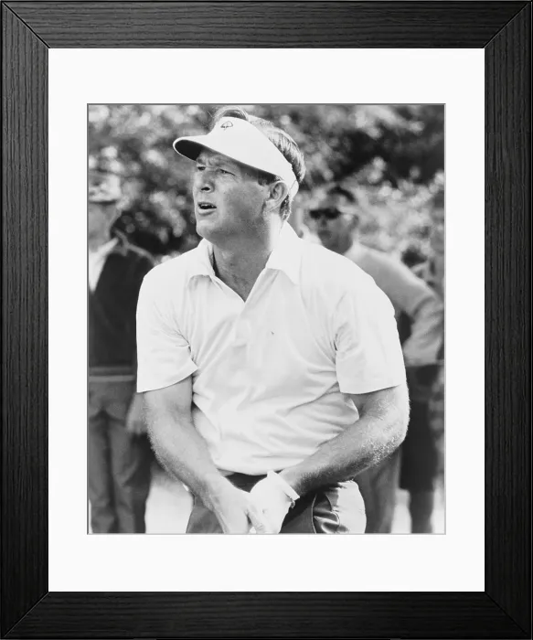 Framed Print : Arnold Palmer watching the flight of his ball in a 1965 golf tournament, possibly at the Masters Tournament, April 8-11, Augusta National Golf Club in Augusta Framed Print : Arnold Palmer watching the flight of his ball in a 1965 golf tournament, possibly at the Masters Tournament, April 8-11, Augusta National Golf Club in Augusta