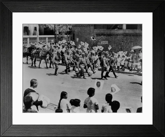 Framed Print : Japanese residents of Beijing, China, welcome Japanese invaders. Men, Women and children wave flags and shout Banzai to invading Japanese troops, 1937