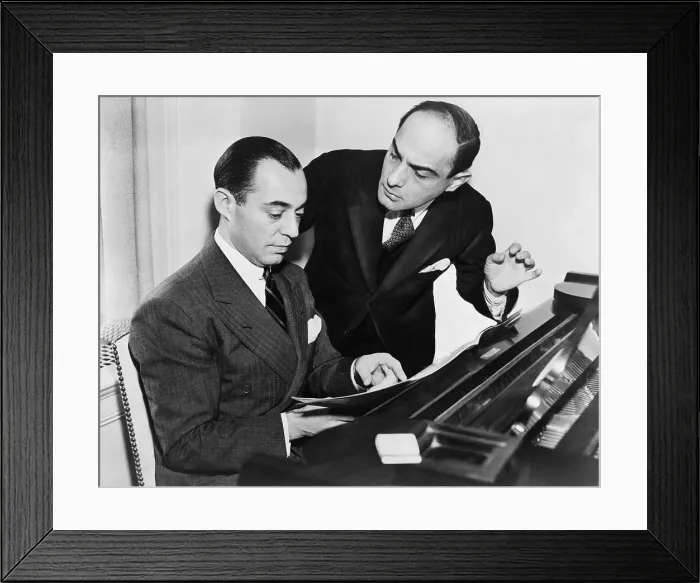 Framed Print : Songwriting team Richard Rodgers at piano working with lyricist Lorenz Hart. 1936. (BSLOC_2013_9_14)