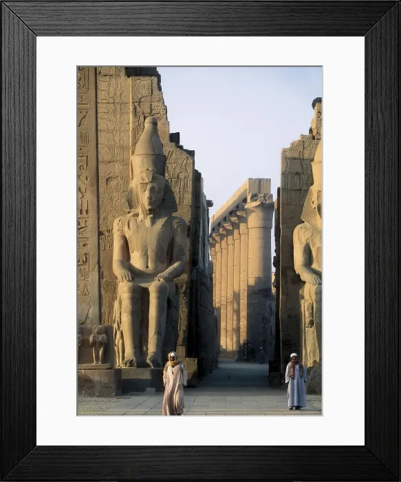 Framed Print : Temple of Amon - Ra. EGYPT. QUENA. Luksor. Thebes. Temple of Amon - Ra. Pylon of Ramesses II (13th c. BC), with colossal statues of the pharaoh. Egyptian art. New Kingdom