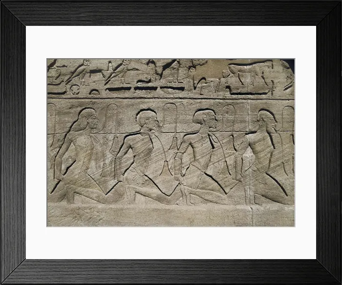 Framed Print : Great Temple of Rameses II. EGYPT. Abu Simbel. Great Temple of Rameses II. Entrance reliefs depicting the military victories of Pharaoh Ramesses II. Prisoners. Egyptian art
