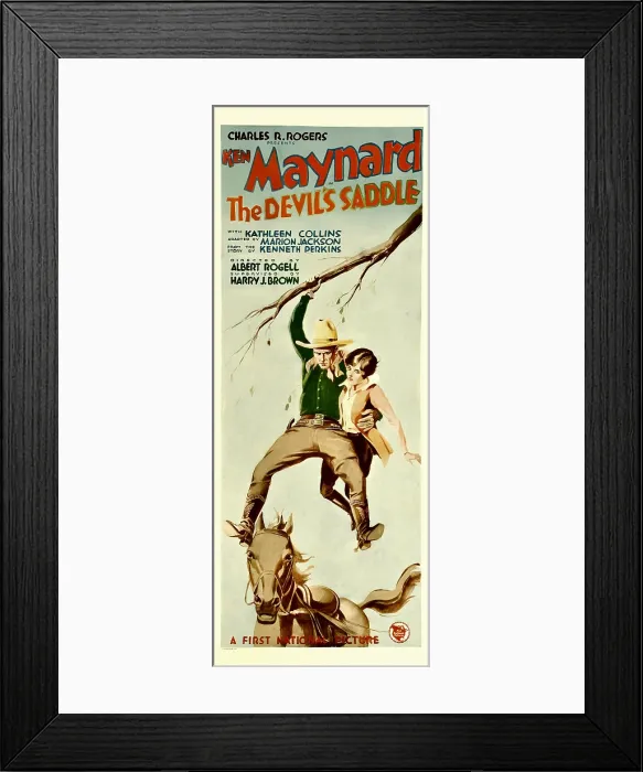 Framed Print : THE DEVIL'S SADDLE, dangling from a tree branch, from left: Ken Maynard, Kathleen Collins; the horse on bottom: Tarzan, 1927 Framed Print : THE DEVIL'S SADDLE, dangling from a tree branch, from left: Ken Maynard, Kathleen Collins; the horse on bottom: Tarzan, 1927