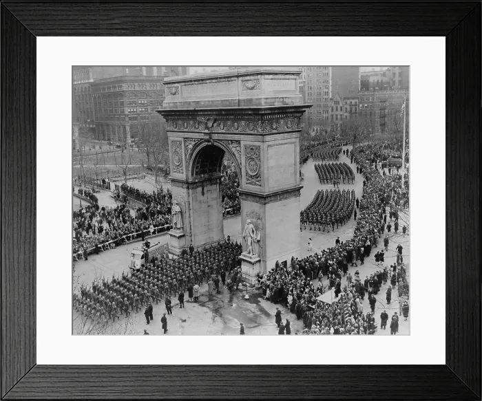Framed Print : U.S. Army soldiers march through Washington Square Arch in New York City. The four mile long parade began at Washington Square Park and marched up Fifth Avenue. Jan. 12, 1946