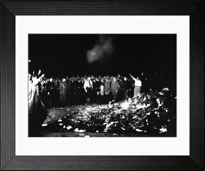 Framed Print : Thousands of books smolder in a huge Nazi huge bonfire, 1933