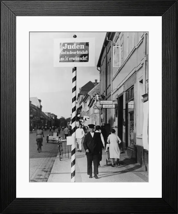 Framed Print : Anti-Semitic message in a Schwedt, Germany commercial district, 1935. Juden sind in dieser Ortschaft nicht erwunscht! translates to Jews not wanted