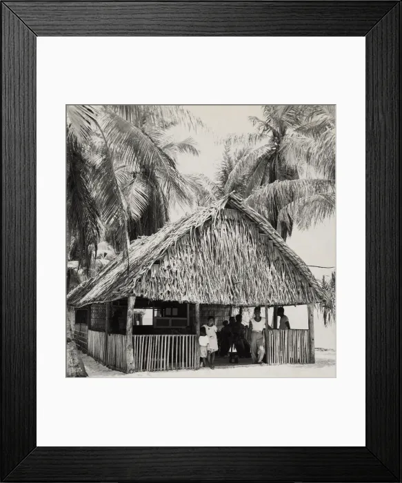 Framed Print : Bikini Islanders in their thatched roof home, ca. March 1946. When the U.S